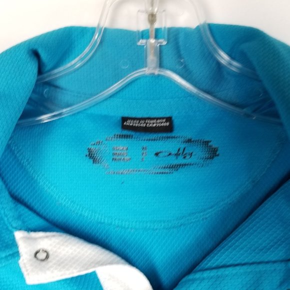 OAKLEY Sleeveless Activewear Top Collared 1/4 Snap Electric Blue Women's size XS - Picture 2 of 4